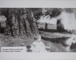 Georgina Volkerts in the front yard of the Volkerts home, Petaluma, California, 1919