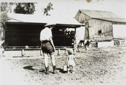 Dorothy Donogh Henning with her son at the Donogh family ranch, 7055 Old Lakeville Highway, Petaluma, California, 1944