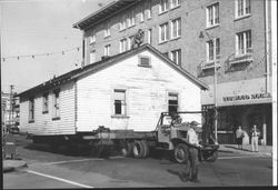 Moving a house down Washington Street, Petaluma, California, 1955