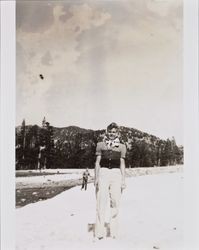 Mary McGregor and an unidentified boy standing in the snow, Mt. Rose, Nevada, 1941