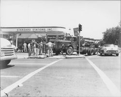 Truck accident at the Standard Station on Petaluma Boulevard South at D Street, Petaluma, California, 1955