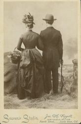 Portrait of an unidentified couple with their backs to the camera