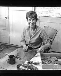 Ginny Lancaster working on metal work project, Santa Rosa, California, July 9, 1968