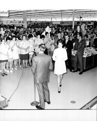 Lawrence S. Gaskell, store manager, introducing his wife, Betty J. Gaskell at grand opening of K-Mart, Santa Rosa, California, 1970