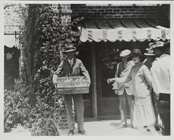 Small crowd outside the Must Hatch Incubator Company