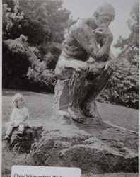 Lillian Claire White contemplates "The Thinker", about 1916