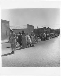 Children dressed as Native Americans and settlers in an Old Adobe Fiesta parade, Petaluma, California, about 1965