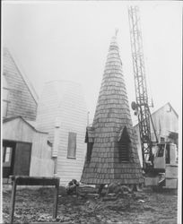 Raising the steeple of Church of One Tree at its Juliliard Park (Santa Rosa, California) location