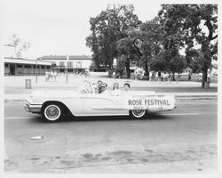 Santa Rosa's Greatest Event--Luther Burbank Rose Festival, May 9 thru 15, sponsored by Santa Rosa Jaycees; signs on a Ford Thunderbird