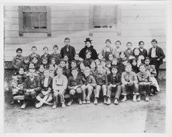 Miss Gillian Rogers with students at Miriam District School