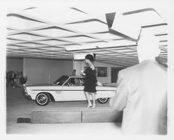 Balk layered dress modeled in a fashion show at dedication of parking garage at 3rd and D, Santa Rosa, California, 1964