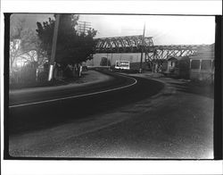 Redwood Highway South road passing under the railroad bridge in Petaluma, California in 1938