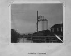 View of south side of Poultry Producers of Central California feed mill under construction taken from the Washington Street Bridge, Petaluma, California, about 1938