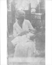 Sonoma Neil Medley with baby Lincoln "Neil" Medley that was likely taken in the backyard of 231 Wilson Street, Petaluma, California, 1919