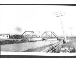 Crossing the bridge, Petaluma, California, about 1900