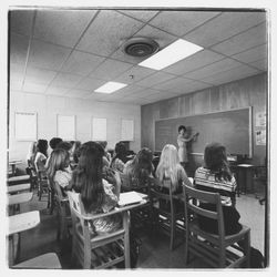 Mrs. Lillian Gorwig teaching shorthand in a classroom scene at Luther Burbank College of Commerce, Santa Rosa, California, 1971