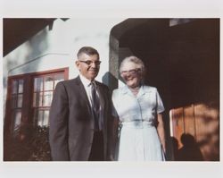 Arthur and Charlotte Purvine standing in front of their home at 500 Keokuk Street, Petaluma, California about 1959