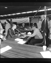 KSRO radio host Shamus O'Grady interviewing San Francisco Forty-Niner Gordy Soltau at grand opening of the Bank of Sonoma County, Santa Rosa, California, March 19, 1973