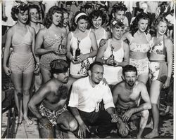 Young women who took part in the wine barrel paddling race and officials at the Healdsburg Harvest Festival, Healdsburg, California, 1946