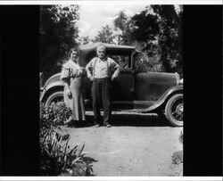 Emma and Seymour Brush standing by a car in Chico, California, about 1939