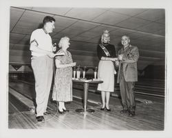 Chonne Patton awarding trophies at Holiday Bowl, Santa Rosa, California, 1959