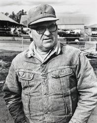 Jack W. Dei, Sr. posing at his dairy ranch located at 831 High School Road, Sebastopol, California, about 1963