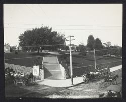 Hill Plaza Park from the corner of Main and Mary Streets amidst horse and buggy traffic