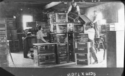 Men stacking incubators