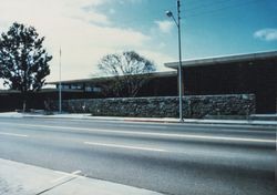 Colored photograph of the new library from the east side of E Street