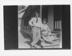 Jack and Charmian London sitting on the porch, Glen Ellen, California, 1914