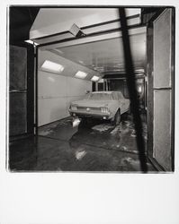 Painting a car at Bishop-Hansel body shop, Santa Rosa, California, 1970