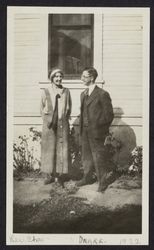 Rev. Charles R. Drake and Joyce V. Drake stand by their home at 431 Tenth Street, Santa Rosa, California,1922