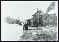 Guerne hop kiln under flood waters