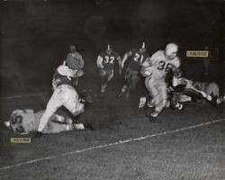 Run Play during Petaluma Leghorn game against Oakland Owls