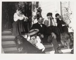 Denman family members seated on the front steps of the Denman residence, about 1904