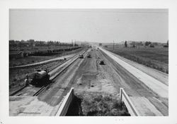 Building the US 101 freeway through Petaluma, California, 1955