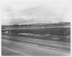 Flooded construction area between Petaluma Boulevard North and Highway 101 in southern Sonoma County, 1950s or 1960s