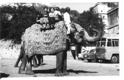 Cornelia "Bunni" Myers Streckfus Cogsdell on left and woman friend riding an elephant in Jaipur, India, October 19, 1972