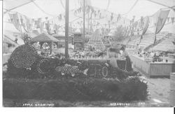 1911 Gravenstein Apple Show Japanese exhibit with a temple made of apples and boxes of apples on either side