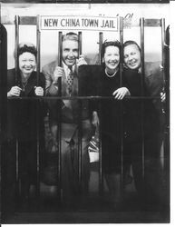 Bunni and George Streckfus and another couple posing inside the "New China Town Jail," possibly in San Francisco, September, 1947