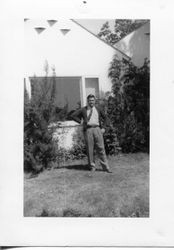 Donald Hallberg in front of the Hallberg family home on Oak Grove Avenue