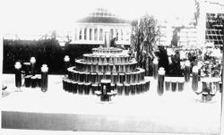 Sebastopol's Gravenstein Apple Show display of flowers in foreground with large vase made of flowers, sponsored by Margaret Butts, Florist 4764