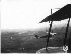 Unidentified wing walker, photographed somewhere above Sebastopol at a 1928 Sebastopol Air Show