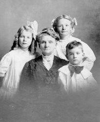 Grandmother Mary Elizabeth Sebring Dovey with her grandchildren, Gladys Fellows, Freva Fellows and Frederick Fellows, September 1, 1910