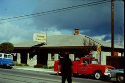 Historic Petaluma & Santa Rosa Railway depot in use as Clarmark Flower Shop at 261 South Main in Sebastopol, California