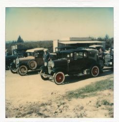 Vintage cars visit the Hallberg Apple Farm roadside stand, October, 1982