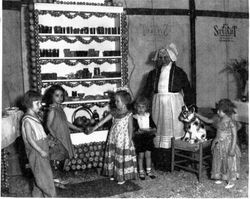 Mary Evelyn Cruse, niece of Hubert B. Scudder, at the Gravenstein Apple Show, about 1932