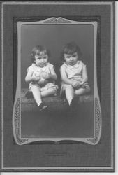 Studio portrait of two unidentified boys, possibly twins, about 1920