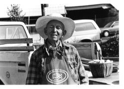 Two photos of Sebastopol Farmers Market exhibitor Joe Arden Pence, DDS, of Mariapple Farm of 1250 Wagnon Road in Sebastopol, about early 2000s