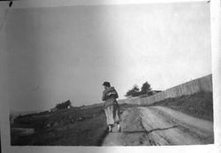 Alice Riddell on a frontage road next to Bodega Bay, about 1920